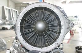 A close up of the front end of an airplane engine.