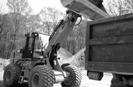 A black and white photo of a construction vehicle.